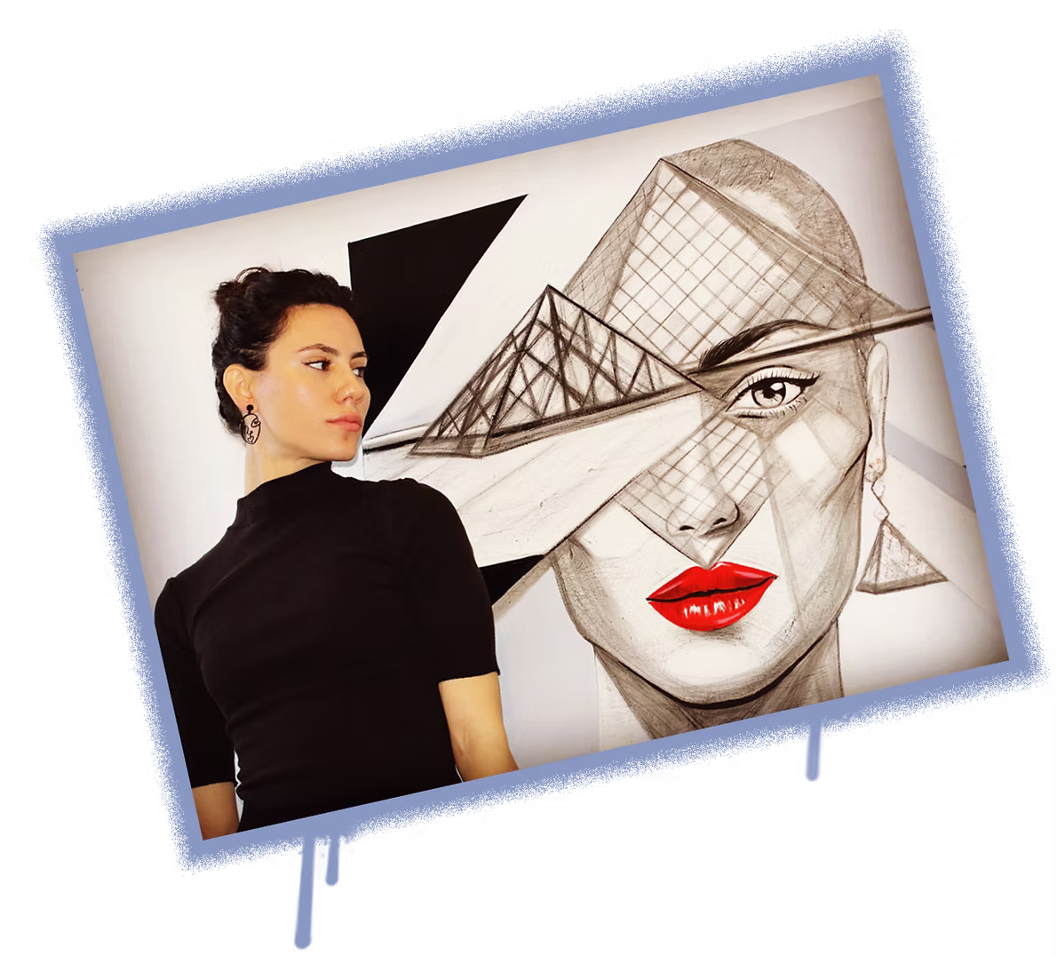 Nia — muralist and visual artist — in front of one of her works